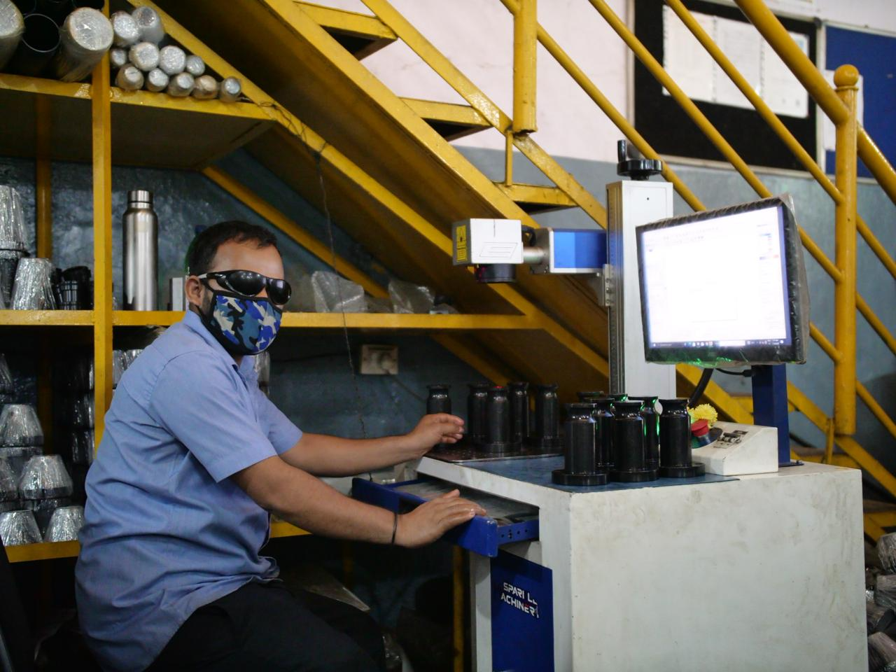 Machined component being inspected with precision measuring instruments